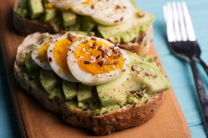 Healthy and nutritious eggs on avo toast