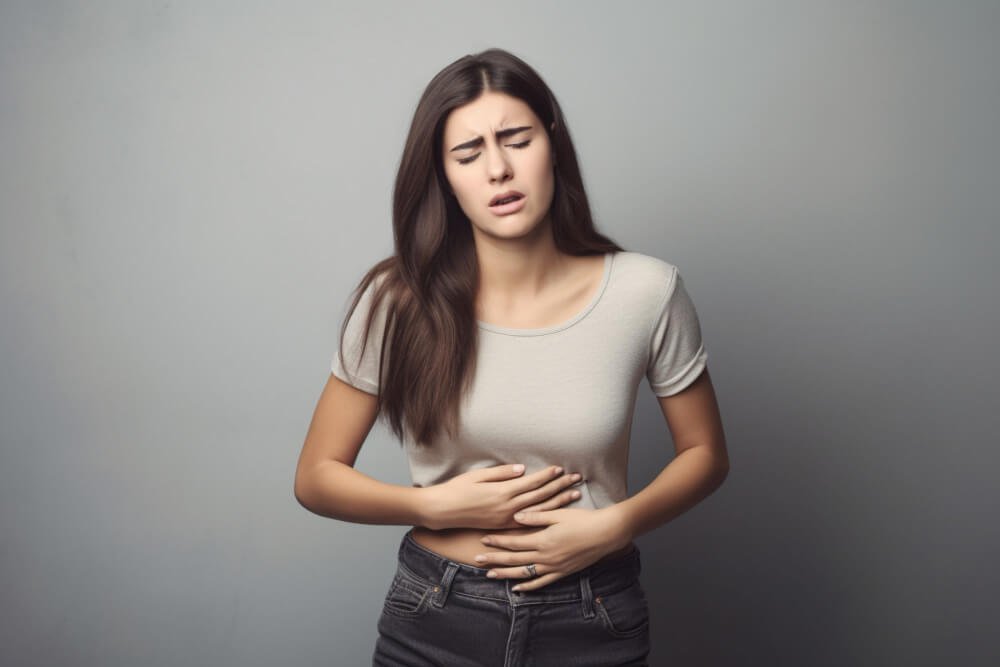 woman with gut and stomach cramps