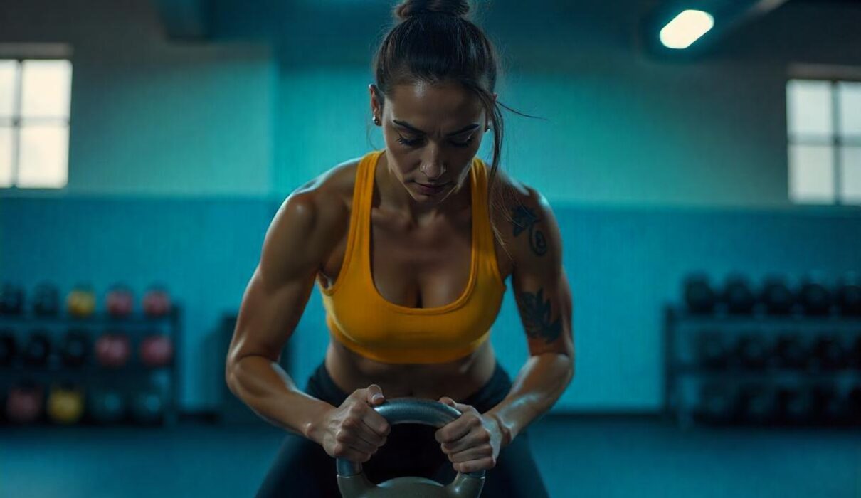 Woman using weights to build muscle