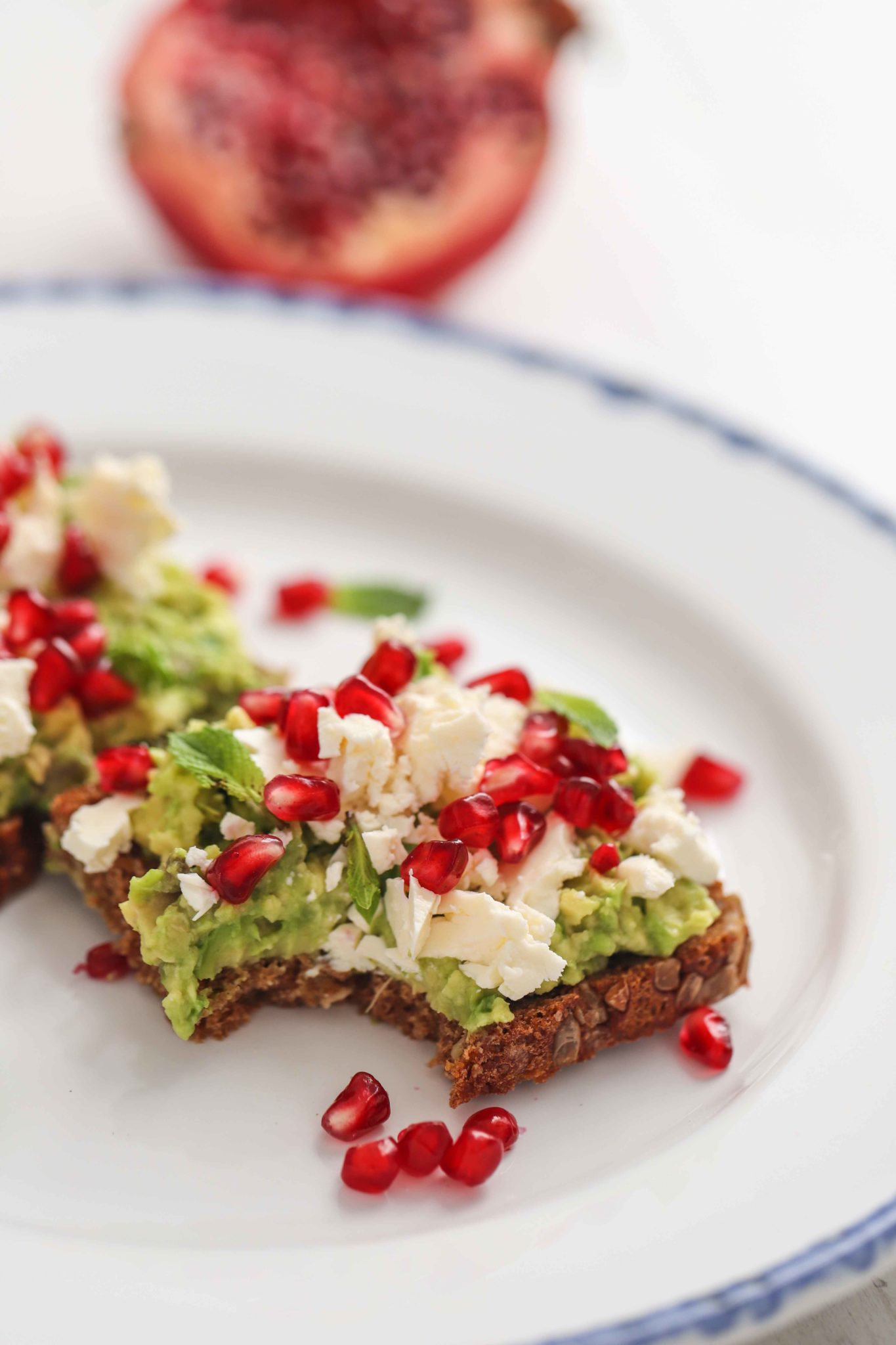 Avocado, feta & pomegranate toast Angedim