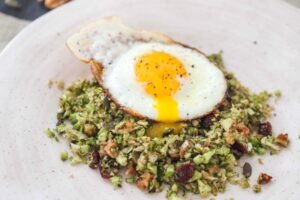 Superfood breakfast egg on a bed of cauliflower rice