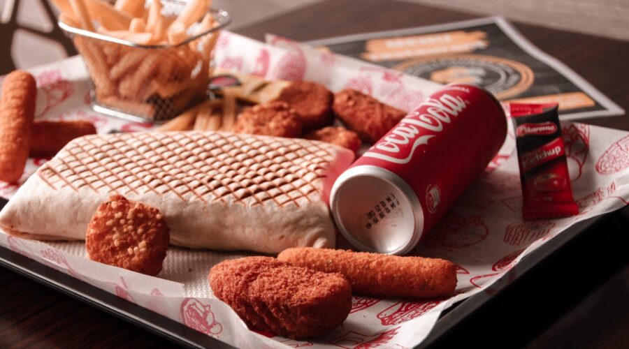 A tray of junk food and soda