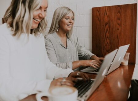 Two women in a happy discussion