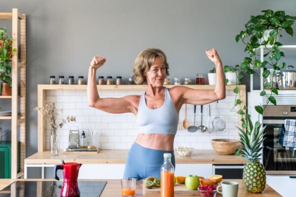Healthy Older Woman Flexing her Muscles