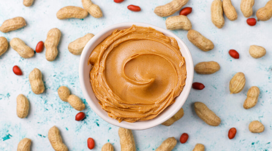 Healthy peanut butter spread with peanuts