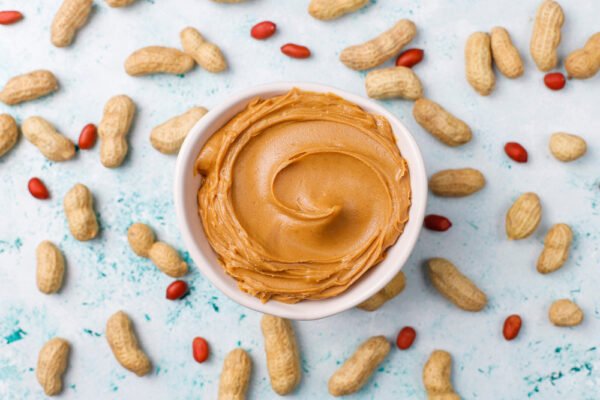 Healthy peanut butter spread with peanuts