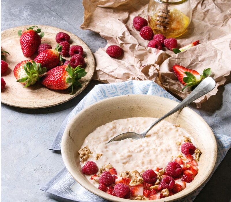 Oatmeal with raspberry in a bowl