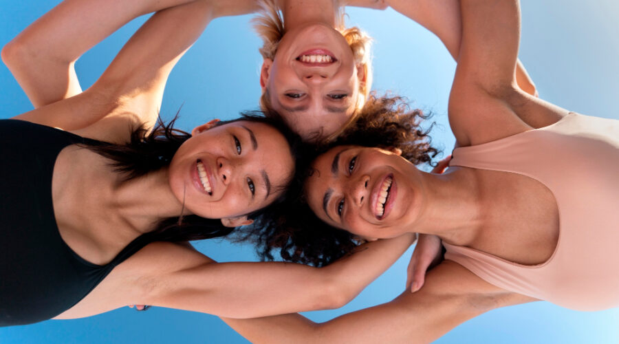 Three women team runners enjoying life embracing