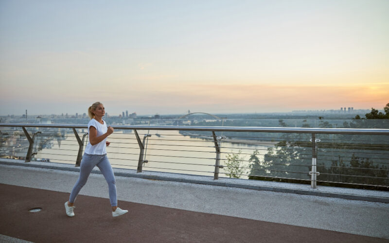Woman power walking early in the morning
