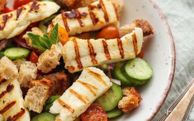 Grilled Halloumi and tomatoes in a bowl
