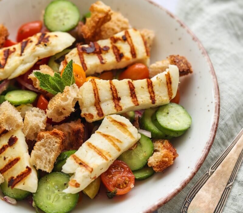Grilled Halloumi and tomatoes in a bowl