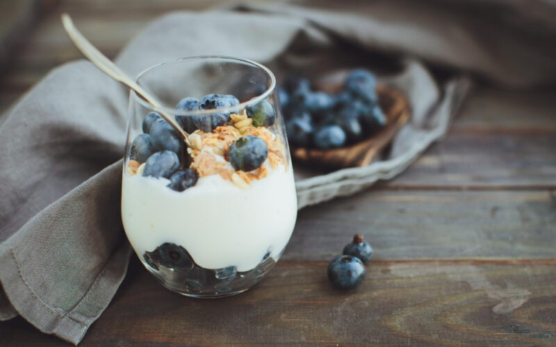 Yogurt and berries help to flourish your microbiome and encourage better health and wellbeing