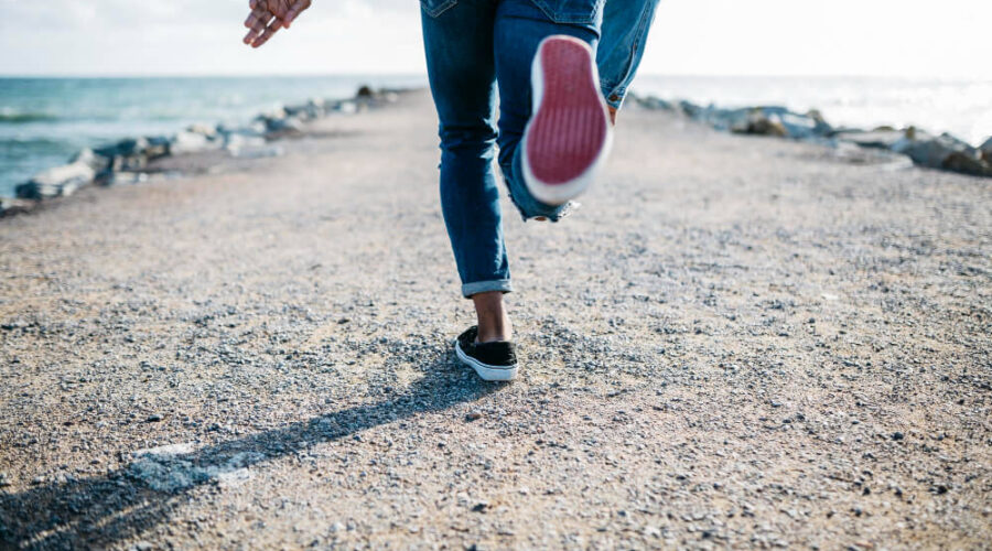 A person running near water